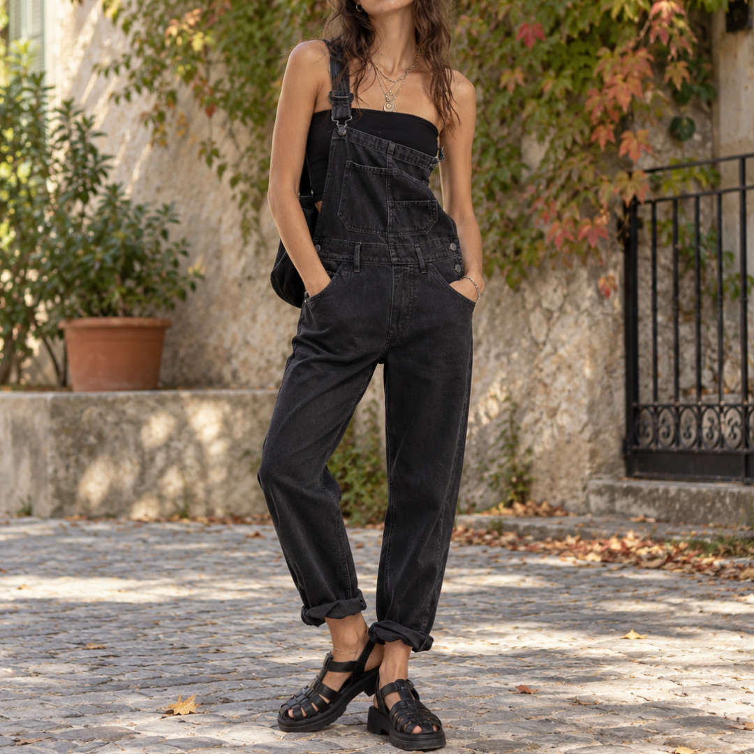 Salopette femme noire délavée avec bretelles à boutons et poches latérales
