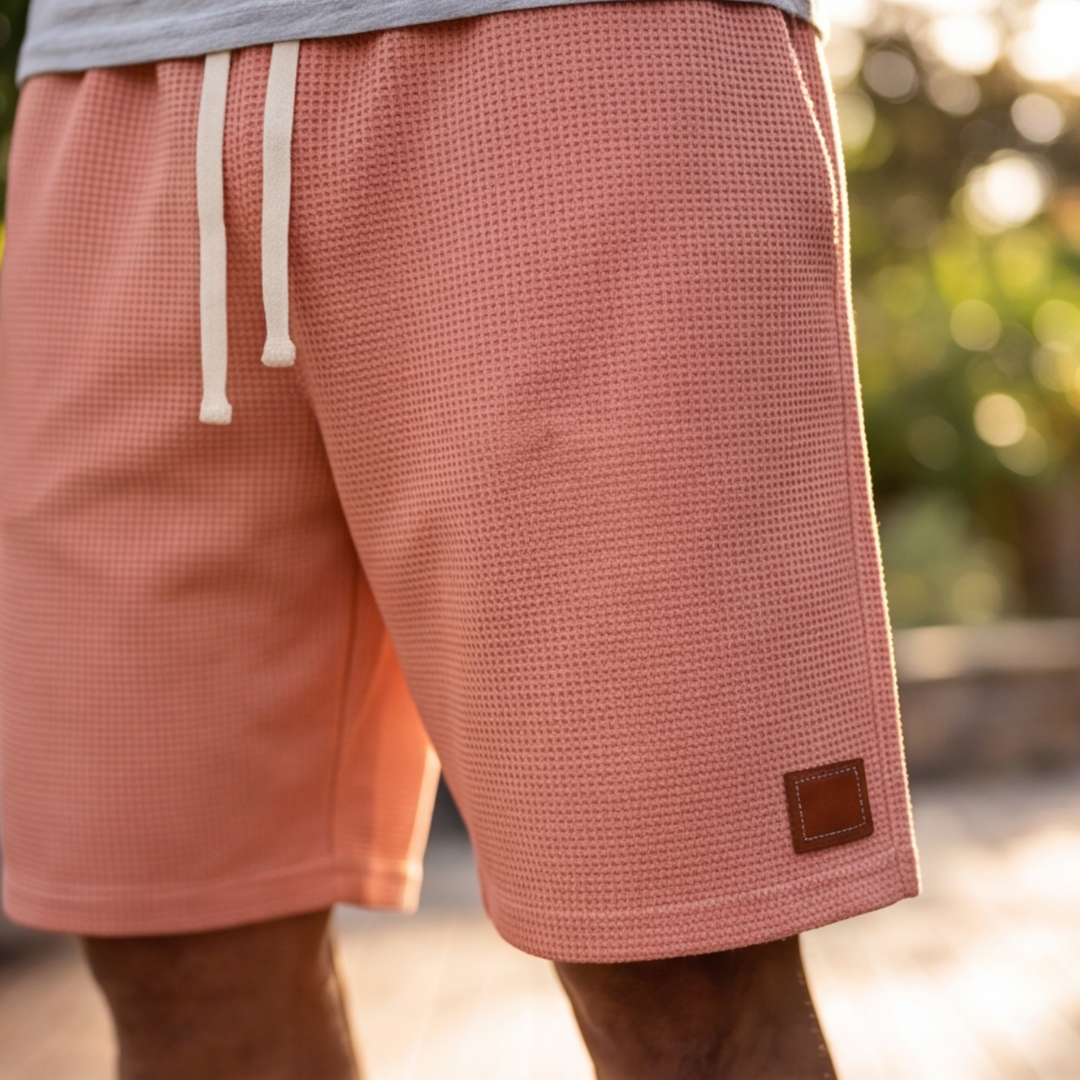 Short homme rose vue latérale gauche, taille élastiquée avec cordon réglable