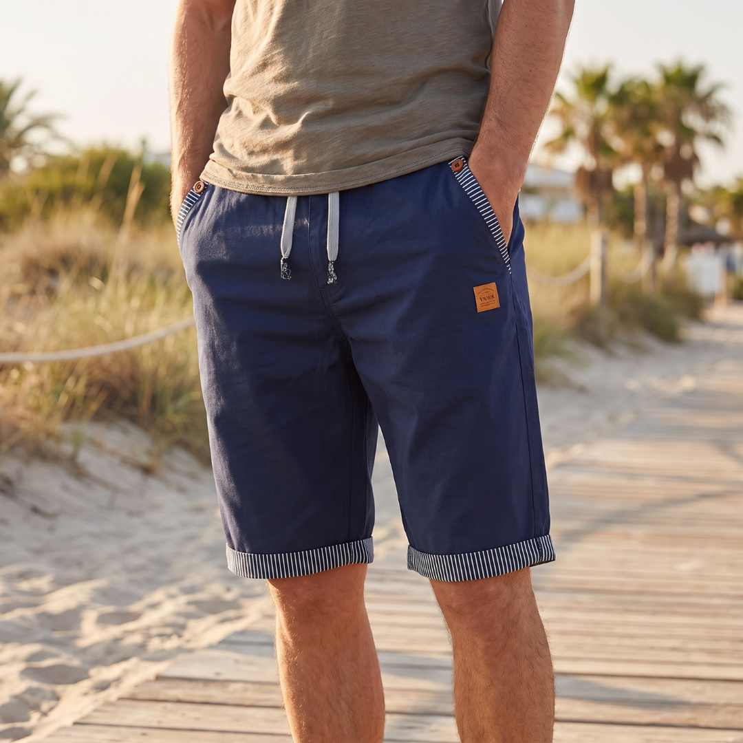 Short homme bleu marine avec ceinture élastique côtelée et passepoil contrasté