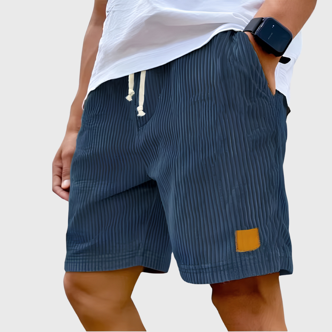 Short homme texturé bleu marine, longueur au-dessus du genou