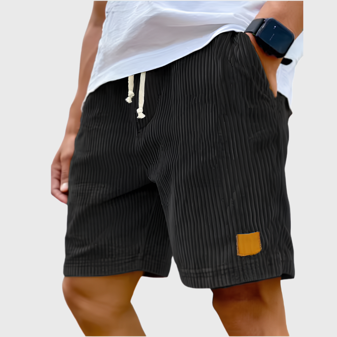Short homme texturé noir avec taille élastiquée et cordon ivoire