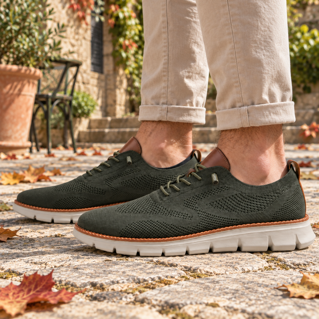 Sneakers homme vertes vues de profil avec lacets fins et liseré cousu