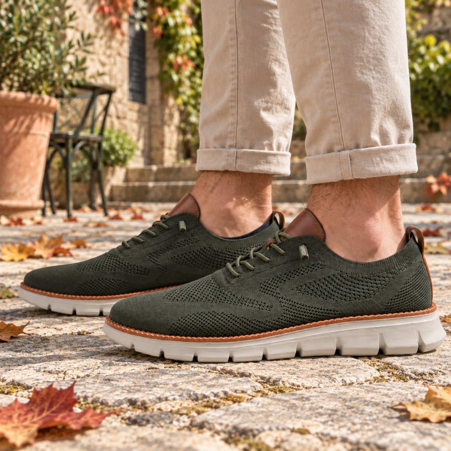 Sneakers homme vertes vues de profil avec lacets fins et liseré cousu