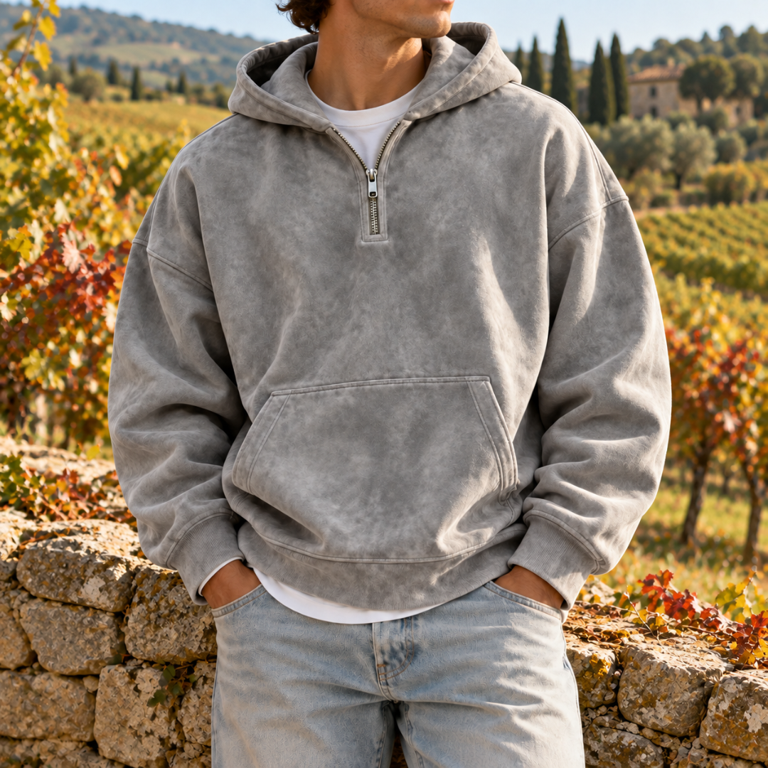 Sweat à capuche homme gris délavé, demi-zip métallique et bas côtelé