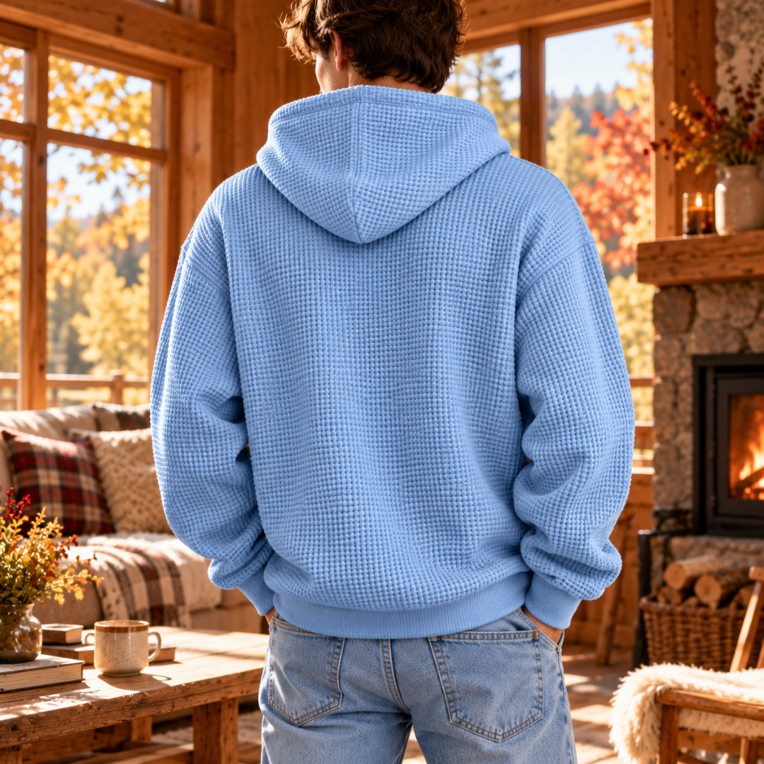 Dos du sweat à capuche homme bleu ciel, capuche et bas côtelé bien visibles