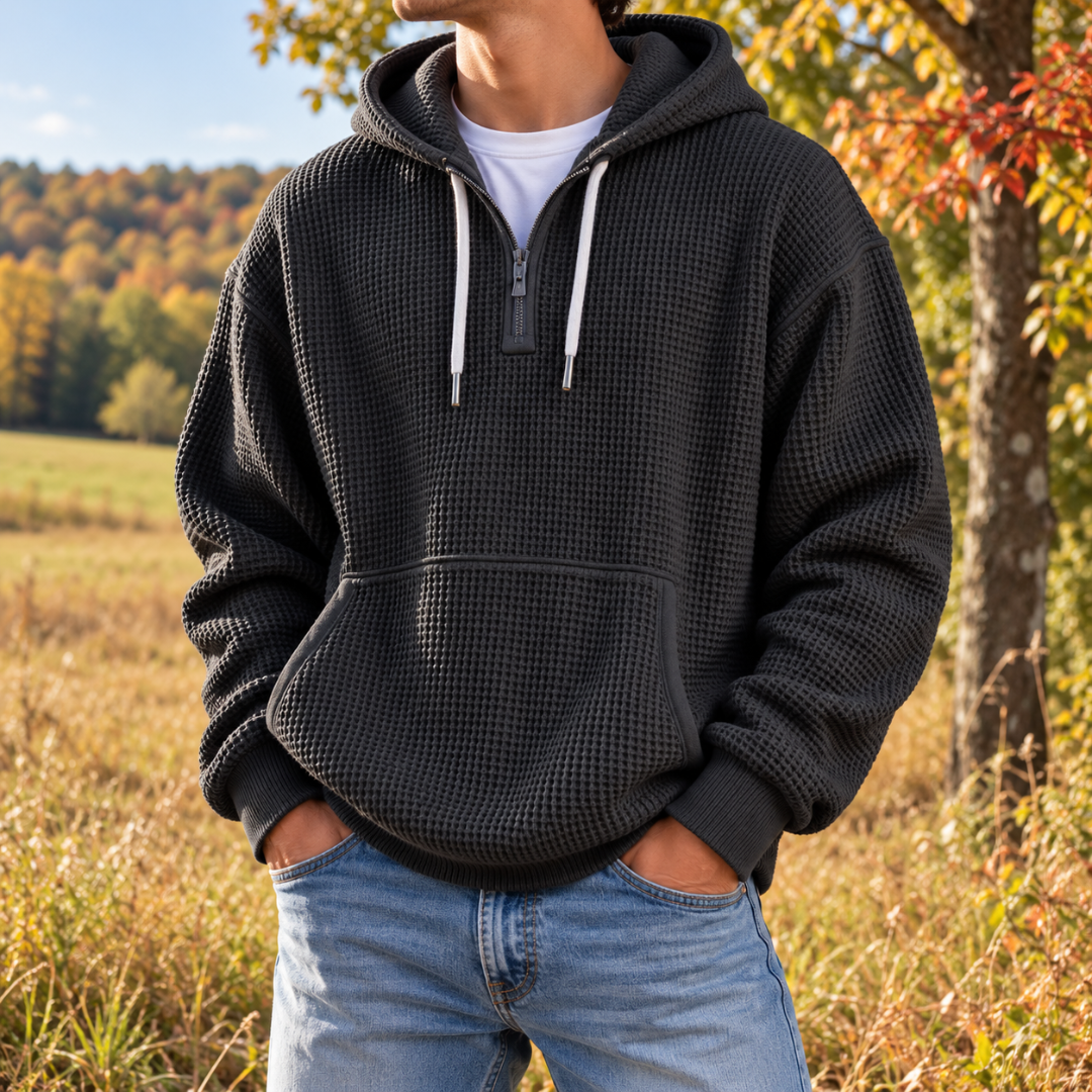Sweat à capuche noir homme à demi-zip, texture gaufrée et cordons blancs