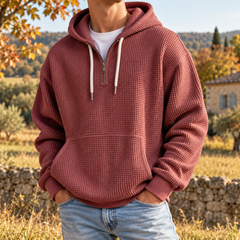 Sweat à capuche terracotta homme à demi-zip, cordons blancs et poche kangourou
