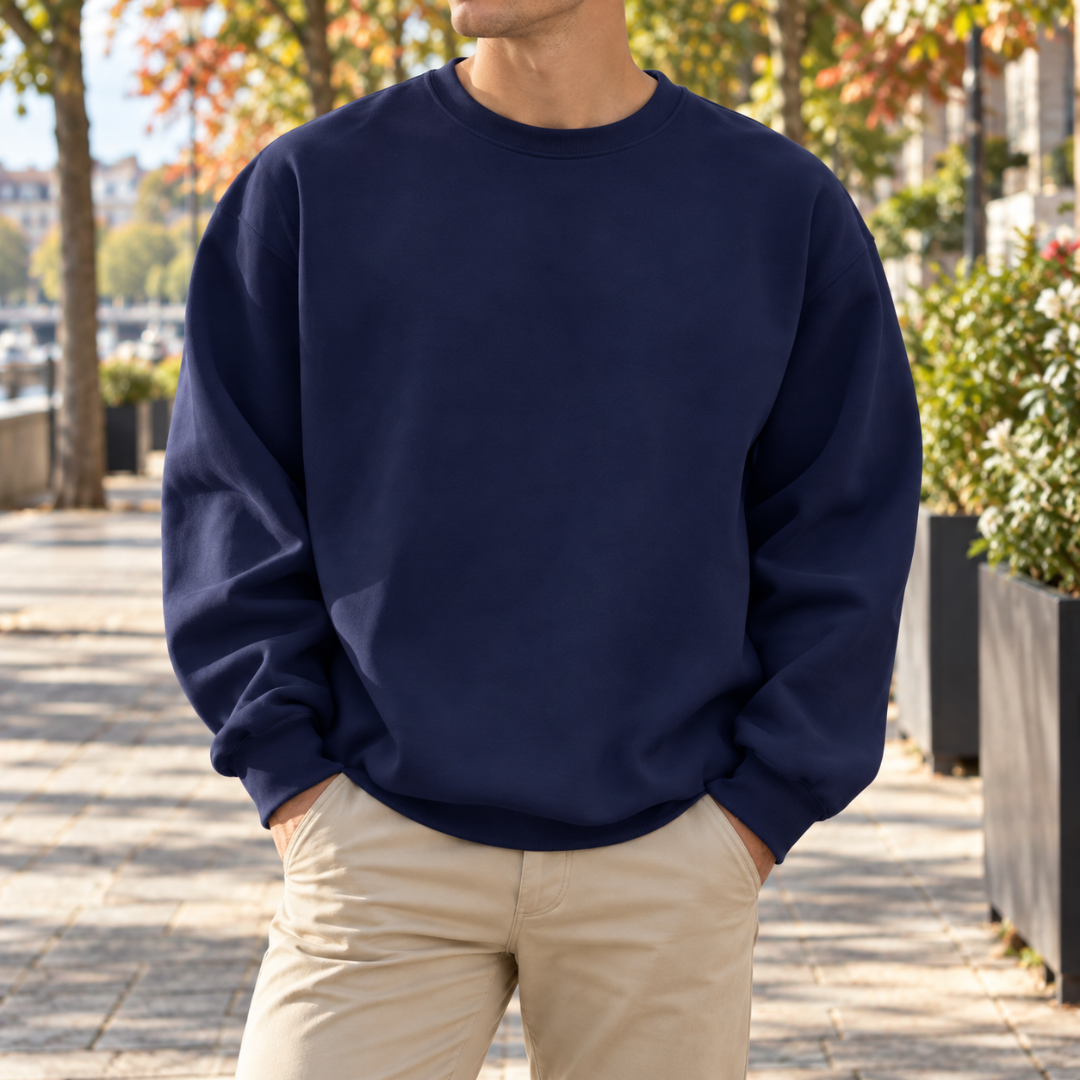 Sweat homme bleu foncé uni à col rond et large base côtelée