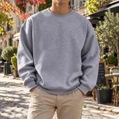 Sweat homme gris chiné à col rond, manches longues et base côtelée