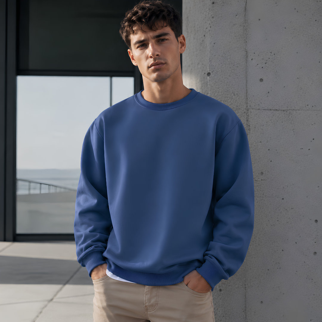 Sweat homme bleu brume uni, col rond côtelé et manches longues amples