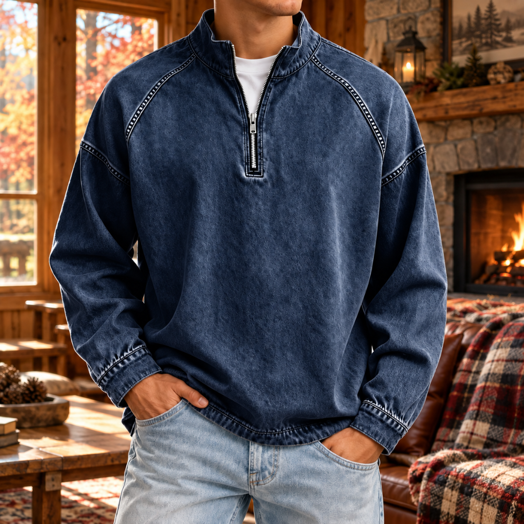 Sweat homme bleu foncé à col montant, demi-zip et surpiqûres apparentes