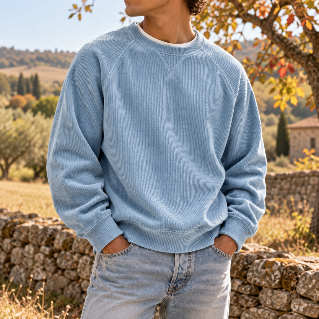 Sweat homme bleu en velours côtelé, col rond côtelé et manches raglan