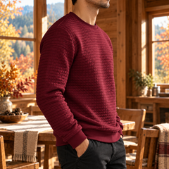 Sweat homme rouge vu de profil, manches longues et poignets à bords côtelés