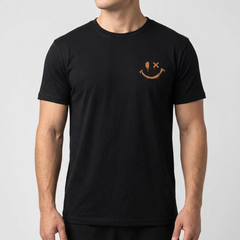 T-shirt homme noir avec imprimé smiley sur la poitrine, vue de face