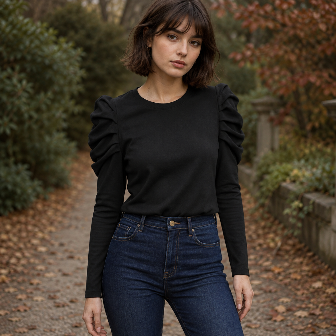 Top noir uni à manches longues bouffantes et encolure ronde, allure nette