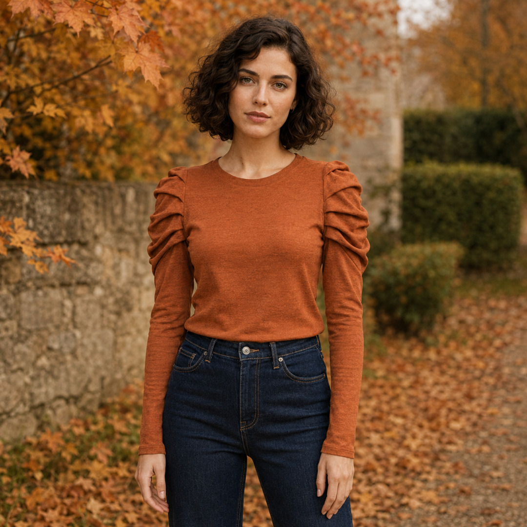 Top femme orange à col rond et manches longues bouffantes froncées aux épaules