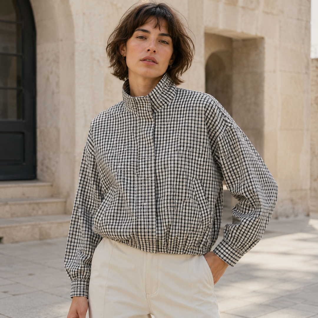 Blouson femme à petits carreaux noir et blanc, fermeture zippée dissimulée au centre