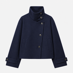 Veste femme courte bleu foncé, coupe boxy et manches larges à poignets boutonnés