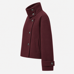 Veste femme courte marron foncé de profil gauche, manche ample et poignet boutonné