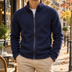 Veste homme bleu marine à col montant, zip argenté et surface texturée mate
