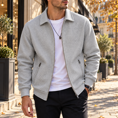 Veste homme grise gaufrée à col chemise, fermeture éclair et poches verticales zippées