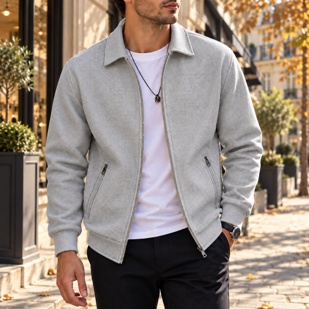 Veste homme grise gaufrée à col chemise, fermeture éclair et poches verticales zippées