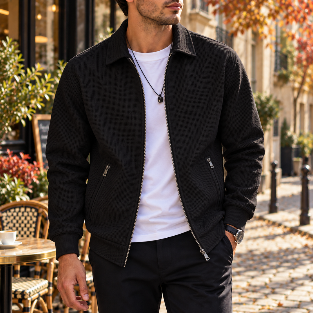Veste homme noire gaufrée avec fermeture éclair, col chemise et deux poches zippées